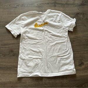 Nike Oversized White Tee with Yellow Floral Accents